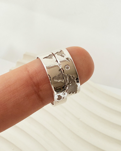 DUO DE ANILLOS MAPA MUNDI Y CIRCON